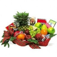 Basket with fruits and candies