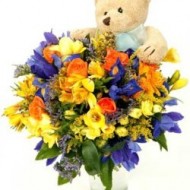 Mix flowers with teddy bear