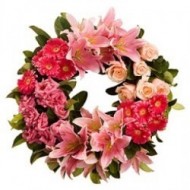 Crown of roses, gerberas and lilies