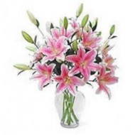 Glass vase of lilies