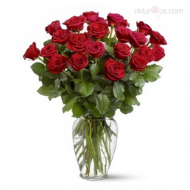 Two dozen roses in a glass vase