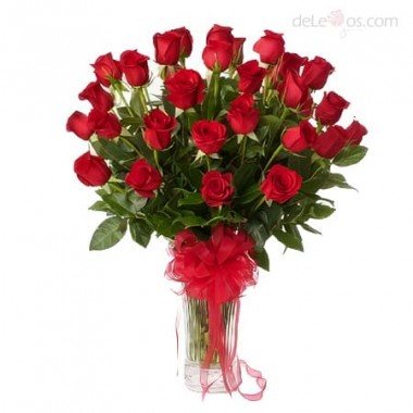 Three dozen roses in a glass vase