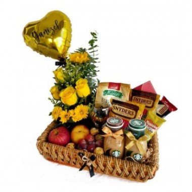 Basket of snacks and yellow flowers