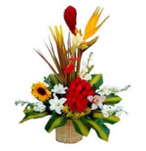Basket of 19 roses with a sunflower, lilies and tropical flowers.