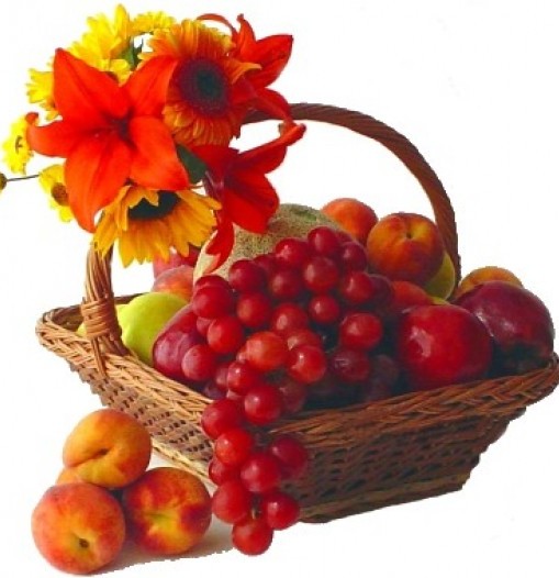Frutal basket with lilies and sunflowers or gerberas