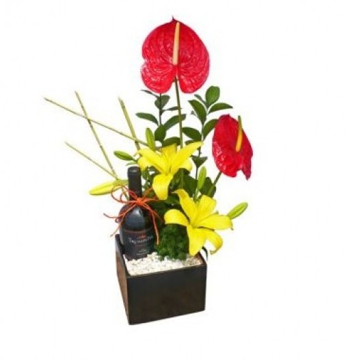 Lilies, anthurium and wine