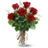 Six roses in a glass vase